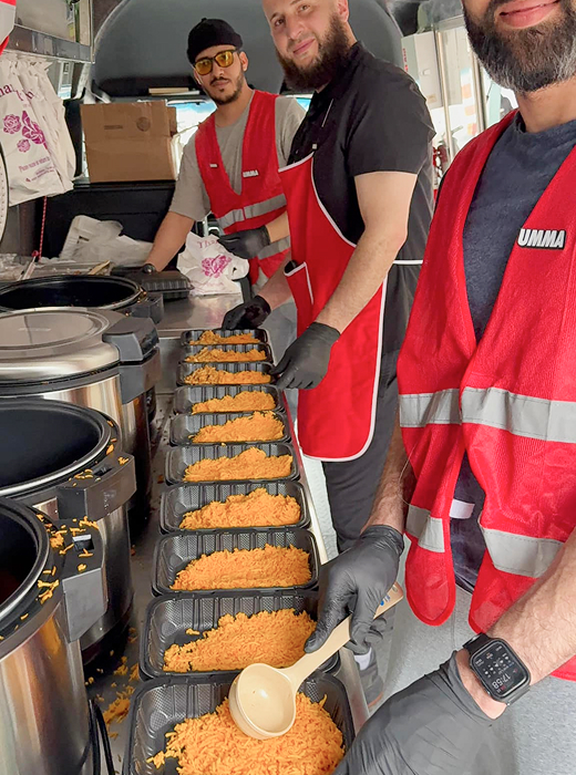 Volunteers preparing food for distribution