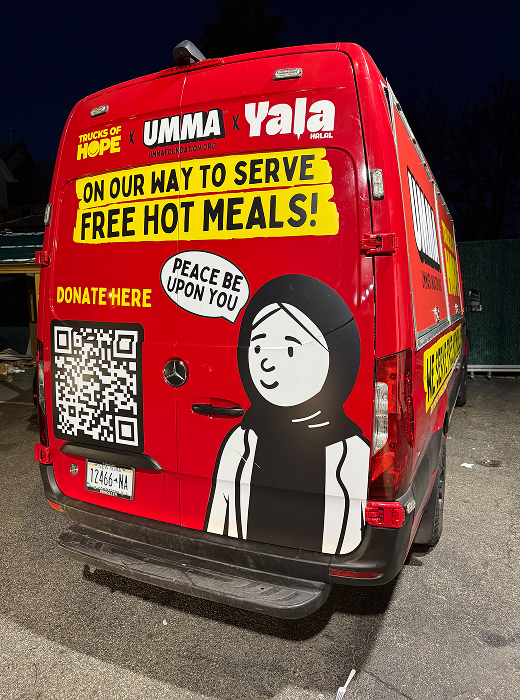 Community members receiving hot meals